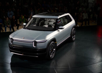 A Rivian R3 prototype crossover electric vehicle (EV) during an unveiling event in Laguna Beach, California, US, on Thursday, March 7, 2024. Rivian surprised investors with a prototype of a future crossover EV called R3, saying this model would be priced lower than the R2. Photographer: Kyle Grillot/Bloomberg
