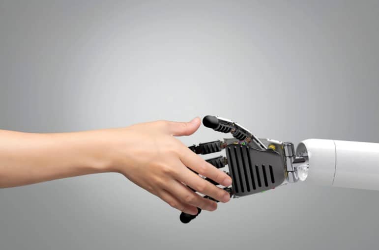 robot and human hand touching